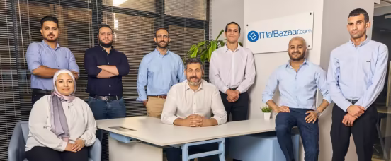 Mal Bazaar team members standing together as a group